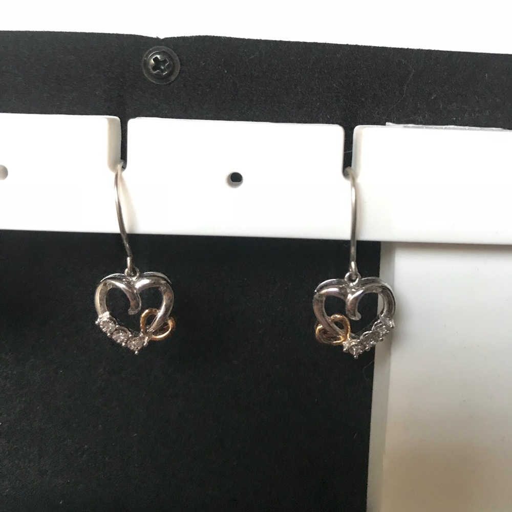 Matching heart gold and silver earrings